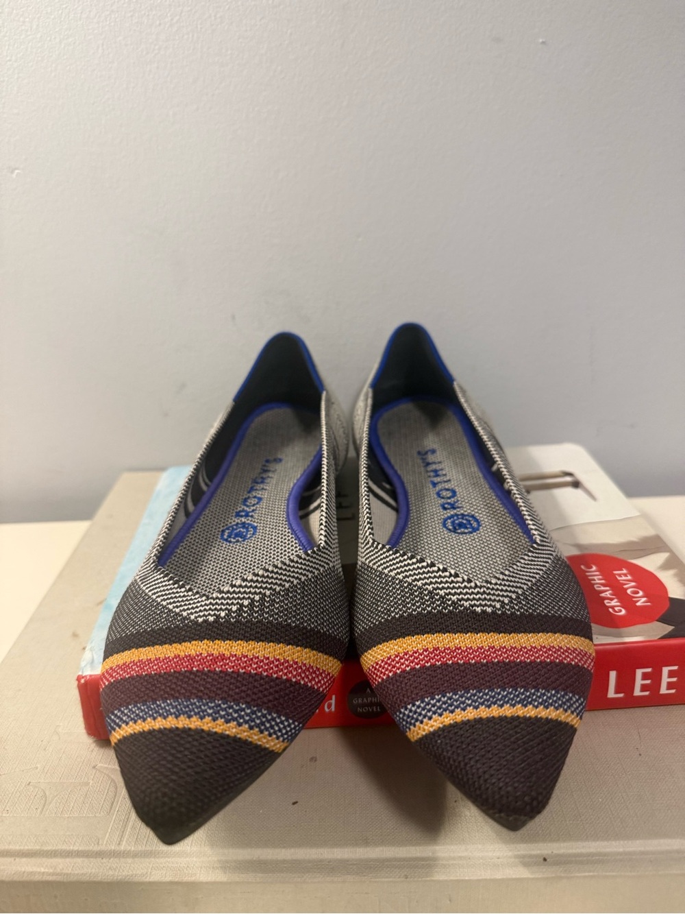 Rothy's Pointed Knit Flats - Black with Red, Yellow & Blue Stripes